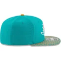 petten-plat-blauw-snapback-9fifty-sideline-van-miami-dolphins-nfl-van-new-era