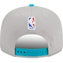 petten-plat-grijs-snapback-9fifty-draft-edition-2023-van-charlotte-hornets-nba-van-new-era