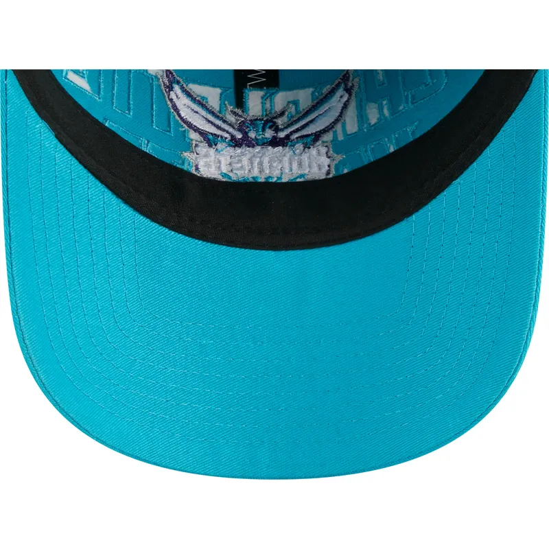 petten-gebogen-blauw-verstelbaar-9twenty-draft-edition-2023-van-charlotte-hornets-nba-van-new-era