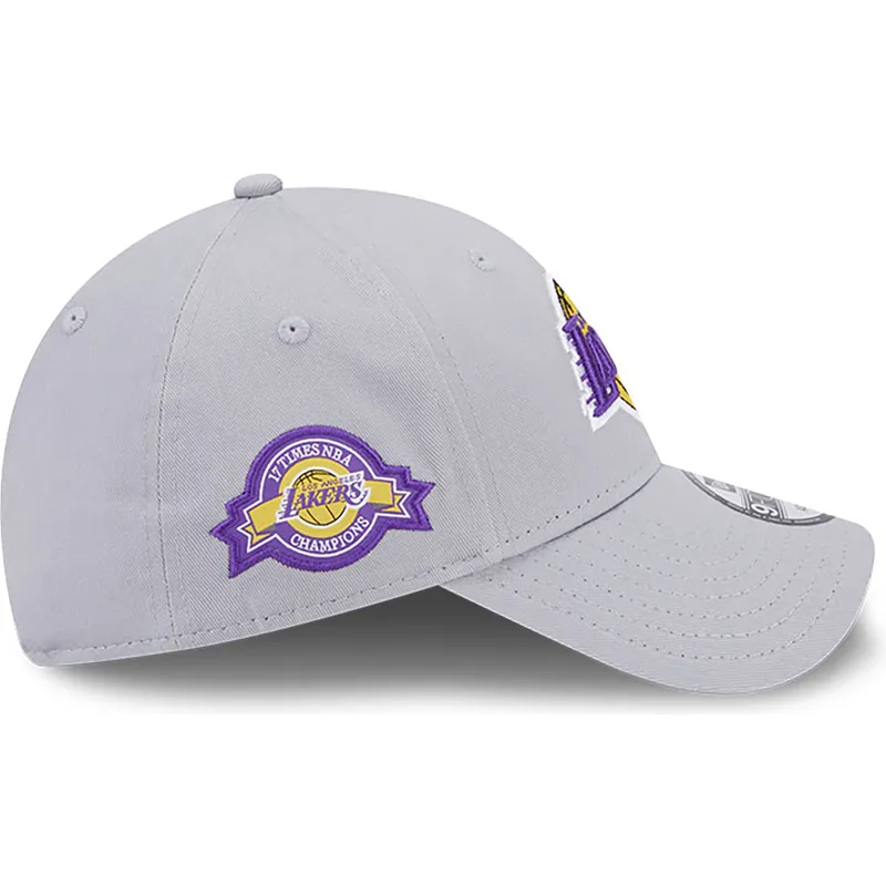 petten-gebogen-grijs-verstelbaar-9forty-team-side-patch-van-los-angeles-lakers-nba-van-new-era