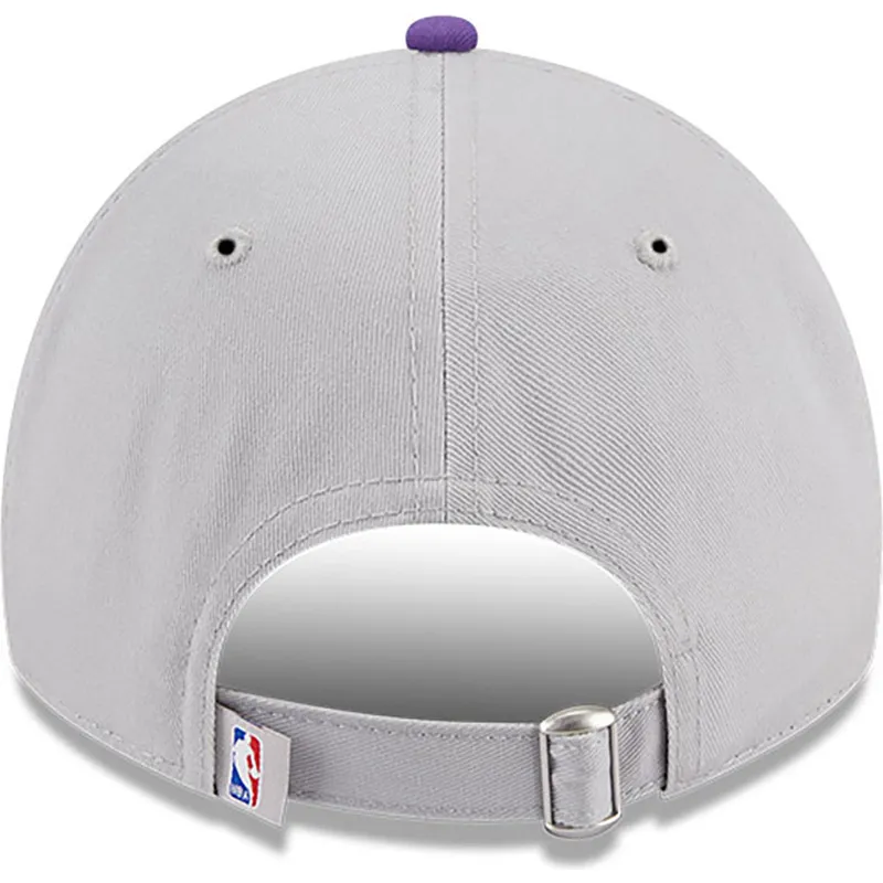 petten-gebogen-grijs-verstelbaar-9twenty-tip-off-2023-van-los-angeles-lakers-nba-van-new-era
