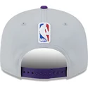 petten-plat-grijs-snapback-9fifty-tip-off-2023-van-los-angeles-lakers-nba-van-new-era