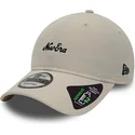 petten-gebogen-beige-verstelbaar-9twenty-repreve-heritage-script-van-new-era