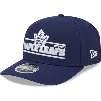 Petten gebogen blauw snapback 9SEVENTY Stretch Snap Stated van Toronto Maple Leafs NHL van New Era