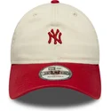 petten-gebogen-beige-verstelbaar-9twenty-mini-washed-van-new-york-yankees-mlb-van-new-era