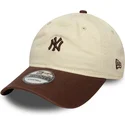 petten-gebogen-beige-verstelbaar-9twenty-mini-washed-van-new-york-yankees-mlb-van-new-era