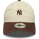 petten-gebogen-beige-verstelbaar-9twenty-mini-washed-van-new-york-yankees-mlb-van-new-era