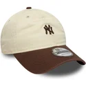 petten-gebogen-beige-verstelbaar-9twenty-mini-washed-van-new-york-yankees-mlb-van-new-era