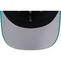 petten-gebogen-blauw-snapback-9seventy-stretch-snap-evergreen-helmet-van-miami-dolphins-nfl-van-new-era