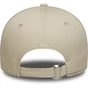 petten-gebogen-beige-verstelbaar-9twenty-living-the-dream-slogan-van-new-era