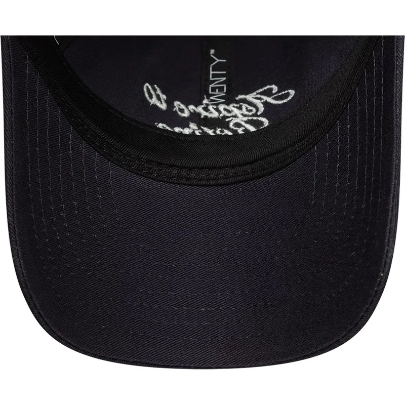 petten-gebogen-marineblauw-verstelbaar-9twenty-aspire-to-retire-slogan-van-new-era